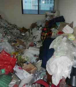 Massive Pile Of Trash At Hoarders Home Before Clean Up