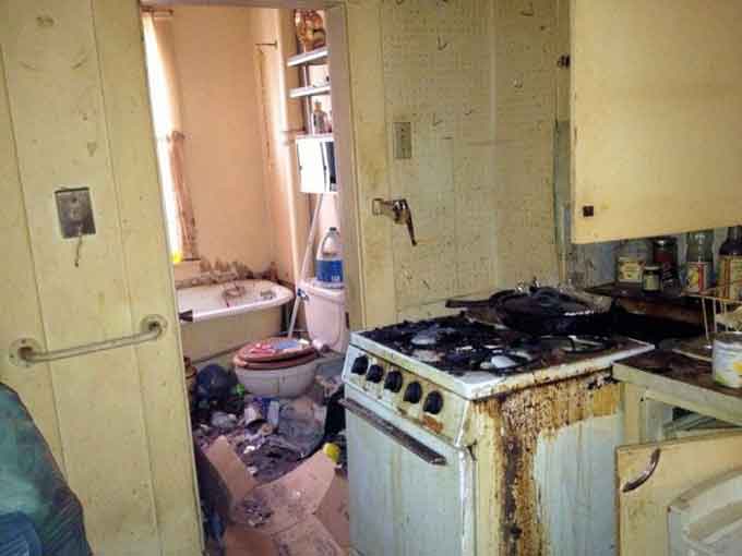Extremely Filthy Kitchen And Bathroom Of Hoarders House Before Clean Up Services